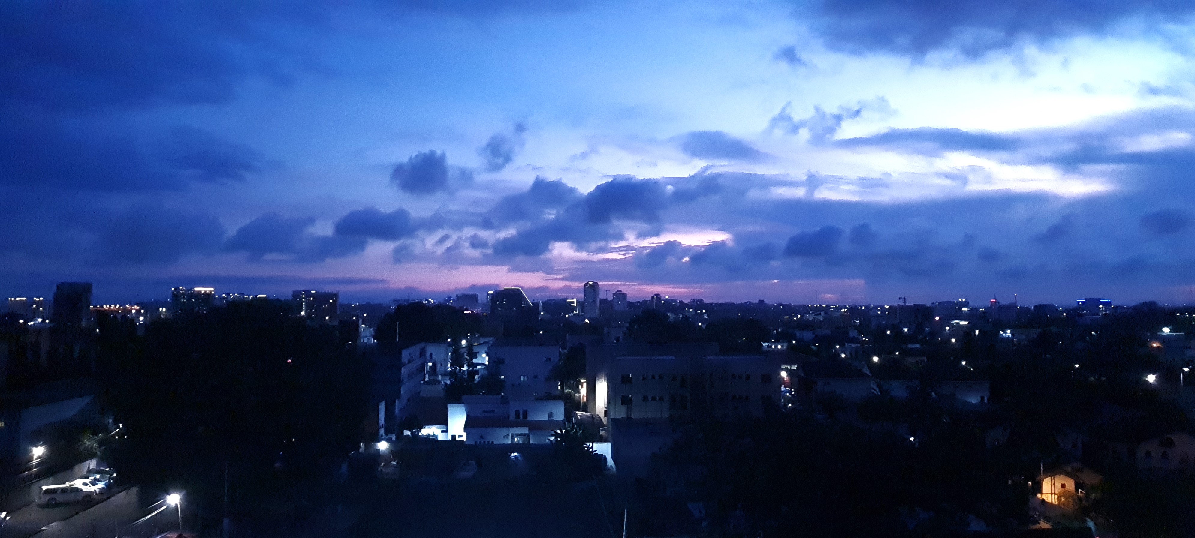 Accra skyline at dusk near Airport City